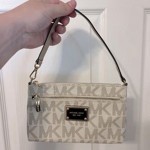 Michael Kors, tan and white wristlet / bag